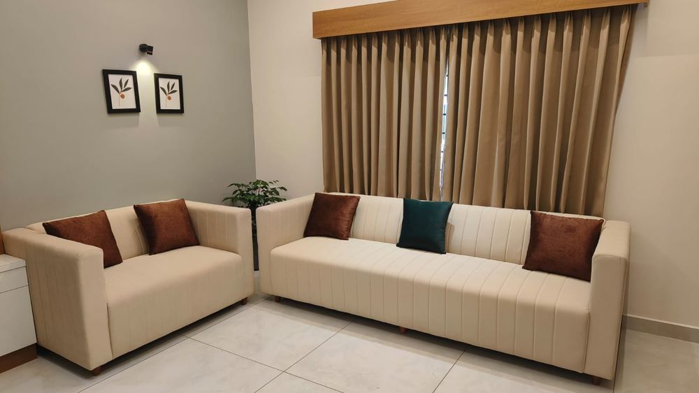 Cream sofa set with curtains