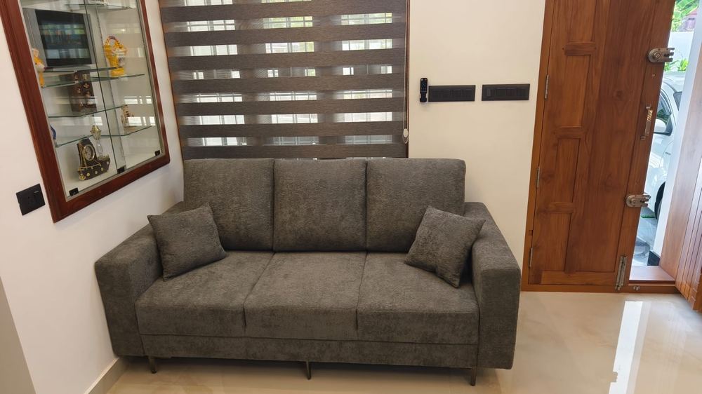 Charcoal three-seater sofa