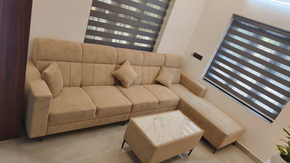 Beige sectional with ottoman