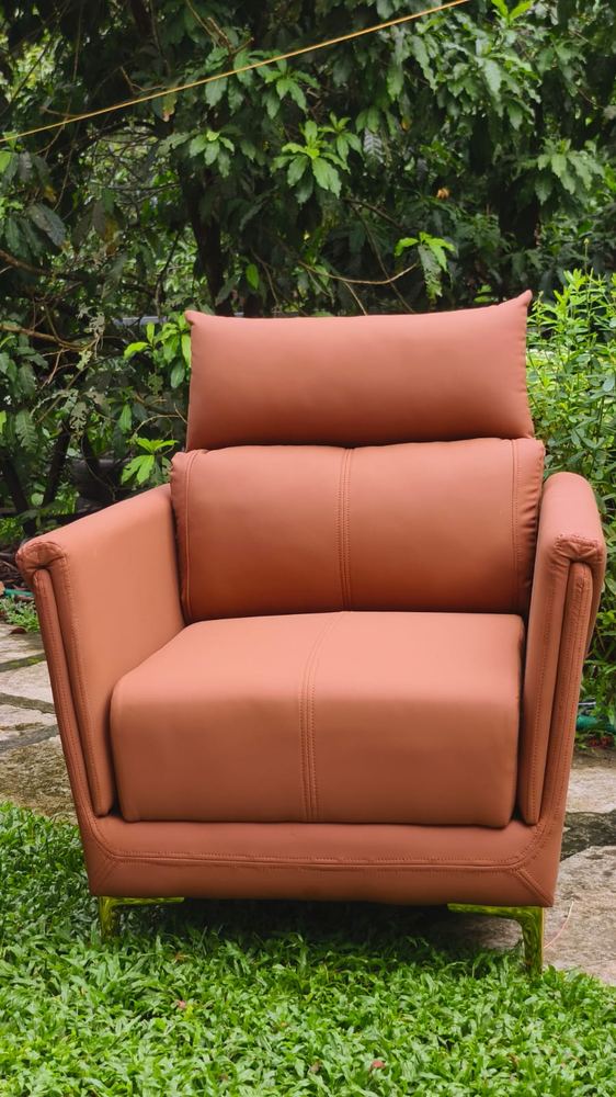 Terracotta leather armchair